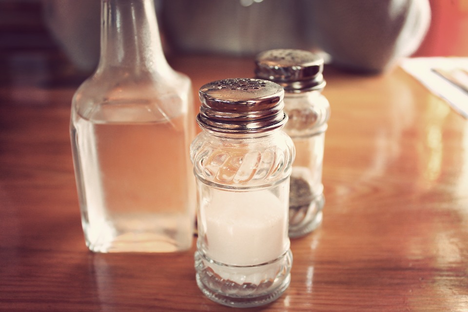 Salt and pepper shakers and vinegar bottle